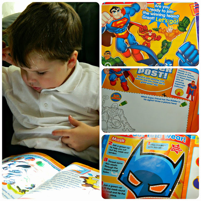 Small boy reading Issue One of DC Super Friends Magazine Comic Batman Superman Green Lantern Flash pages activities makes