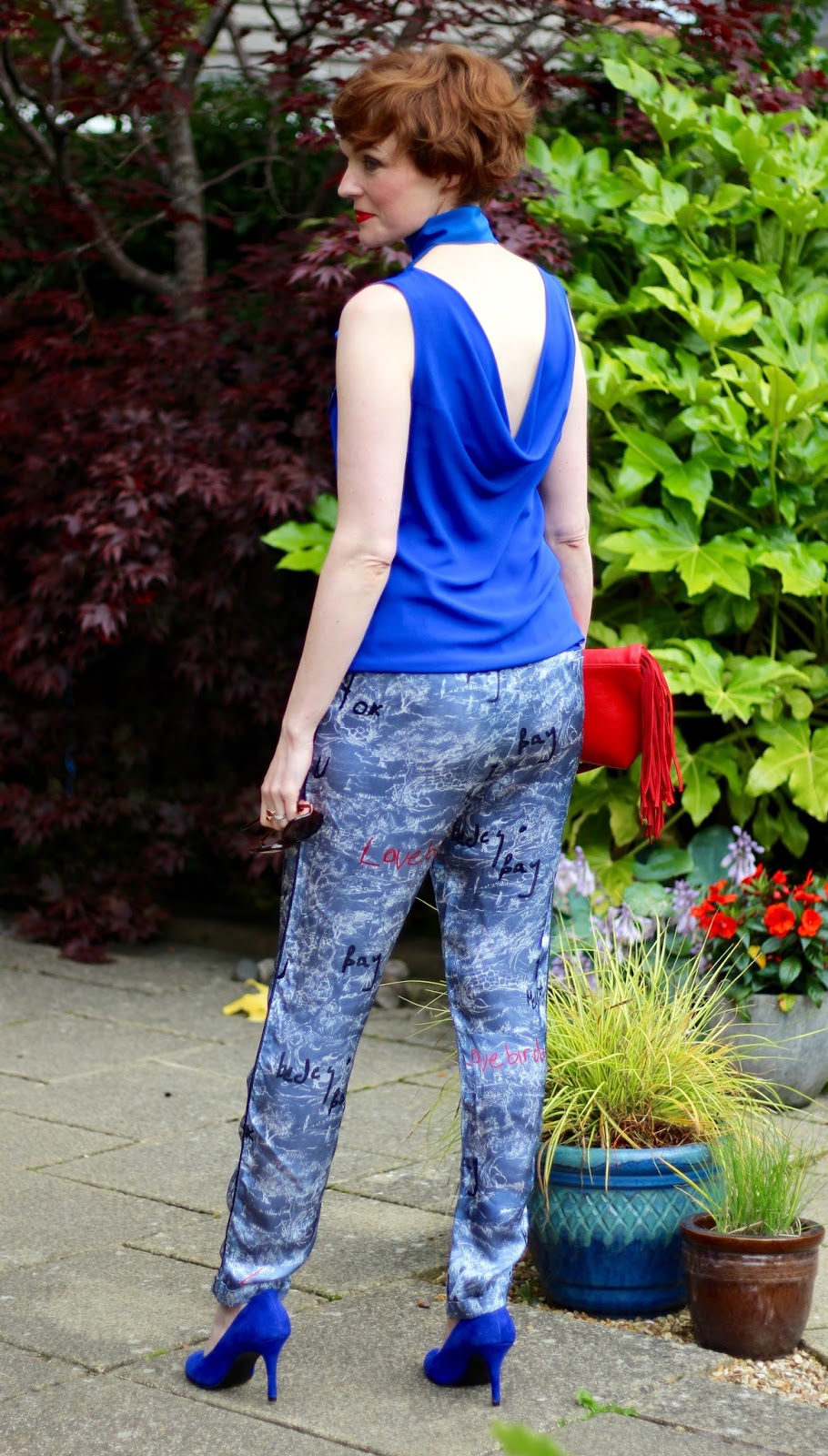 Fake Fabulous | Cobalt blue top worn back to front, pyjama trousers, red lips and blue heels.