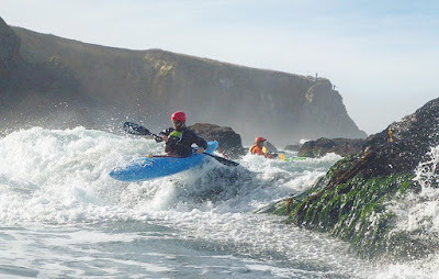 whitewater kayak ocean rock gardening