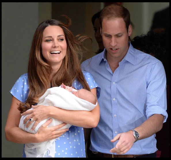 The newborn Prince of Cambridge makes his public debut with adoring parents Prince William and Kate Middleton