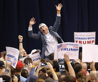 violence as protesters storm stage in donald trump chicago rally