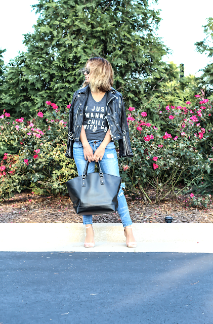 Ripped jeans and black moto Jacket 