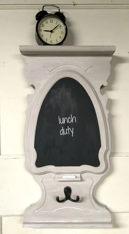 Grey Chalkboard hanging on the wall