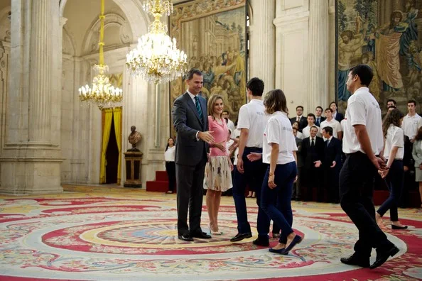 Queen Letizia wore Hugo Boss skirt and blouse