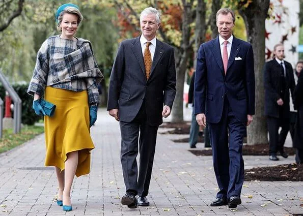 Queen Mathilde wore asymmetric yellow midi dress Natan aw2019 collection. The Queen wore a new asymmetric yellow midi dress by Natan