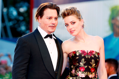 Johnny Depp donates Amber Heard
