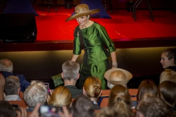 Dutch Queen Maxima attend opening 24th WPATH Symposium in Amsterdam. Queen wore Natan dress, Natan pumps, Natan Clutch, jewelry diamond earrings