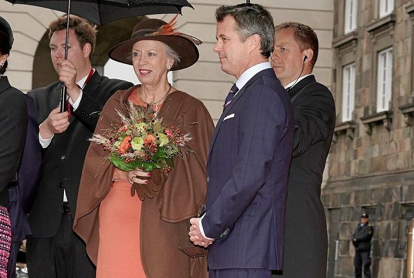 Princess Marie wore Paule Ka White Two Tone Belted Coat and Jimmy Choo pumps. Crown Princess Mary, Princess Benedikte abd Queen Margrethe