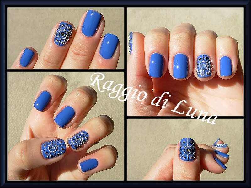 Raggio di Luna Nails: Silver nail art studs and beads on blue