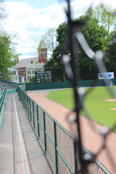 This baseball field in Cooperstown is clean with lots of seating space. 