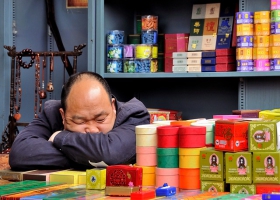 A man taking a nap. A man taking a nap.