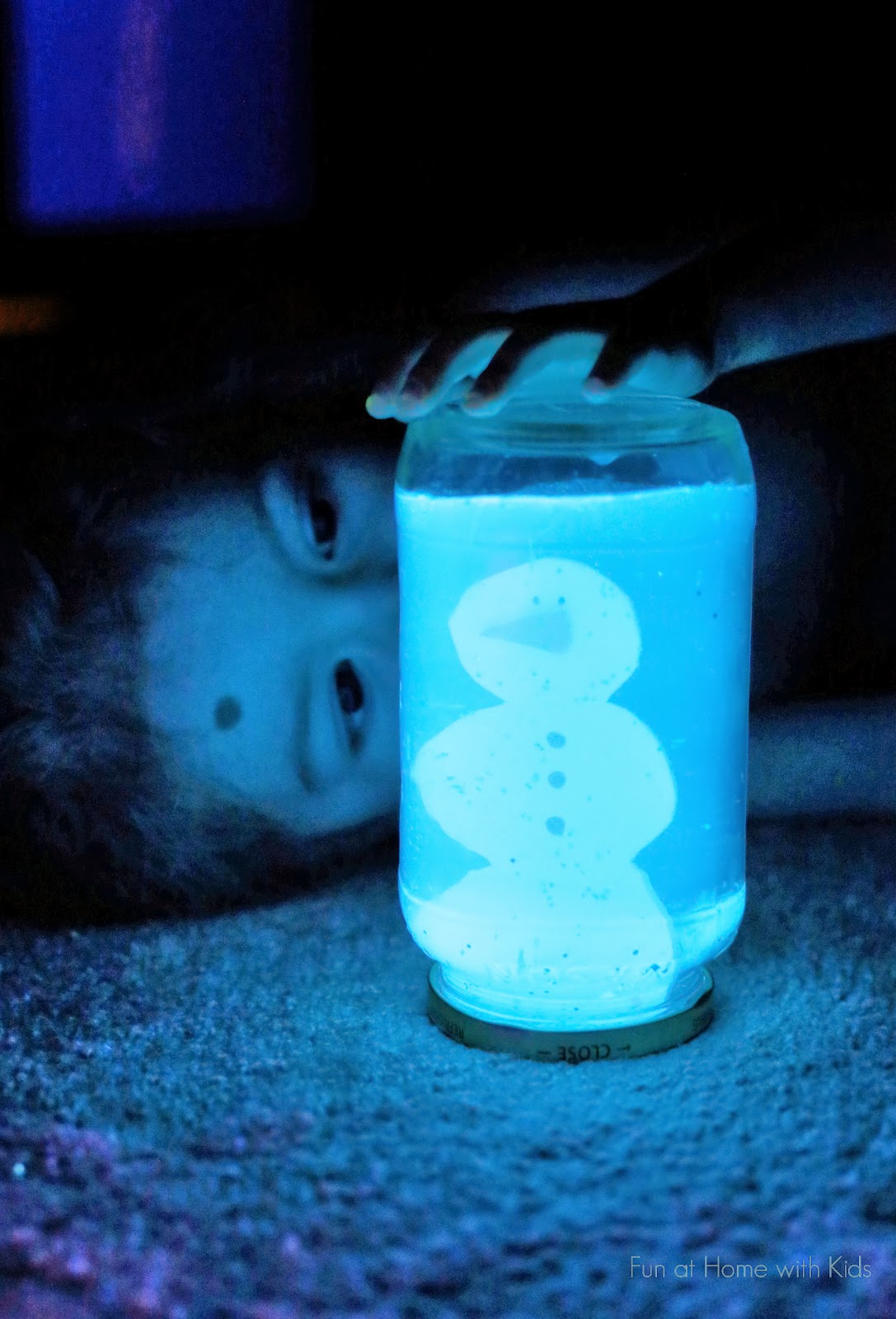 DIY Glowing Snow Globe - quick and easy to make - and it functions just like a regular snow globe in normal light.  From Fun at Home with Kids