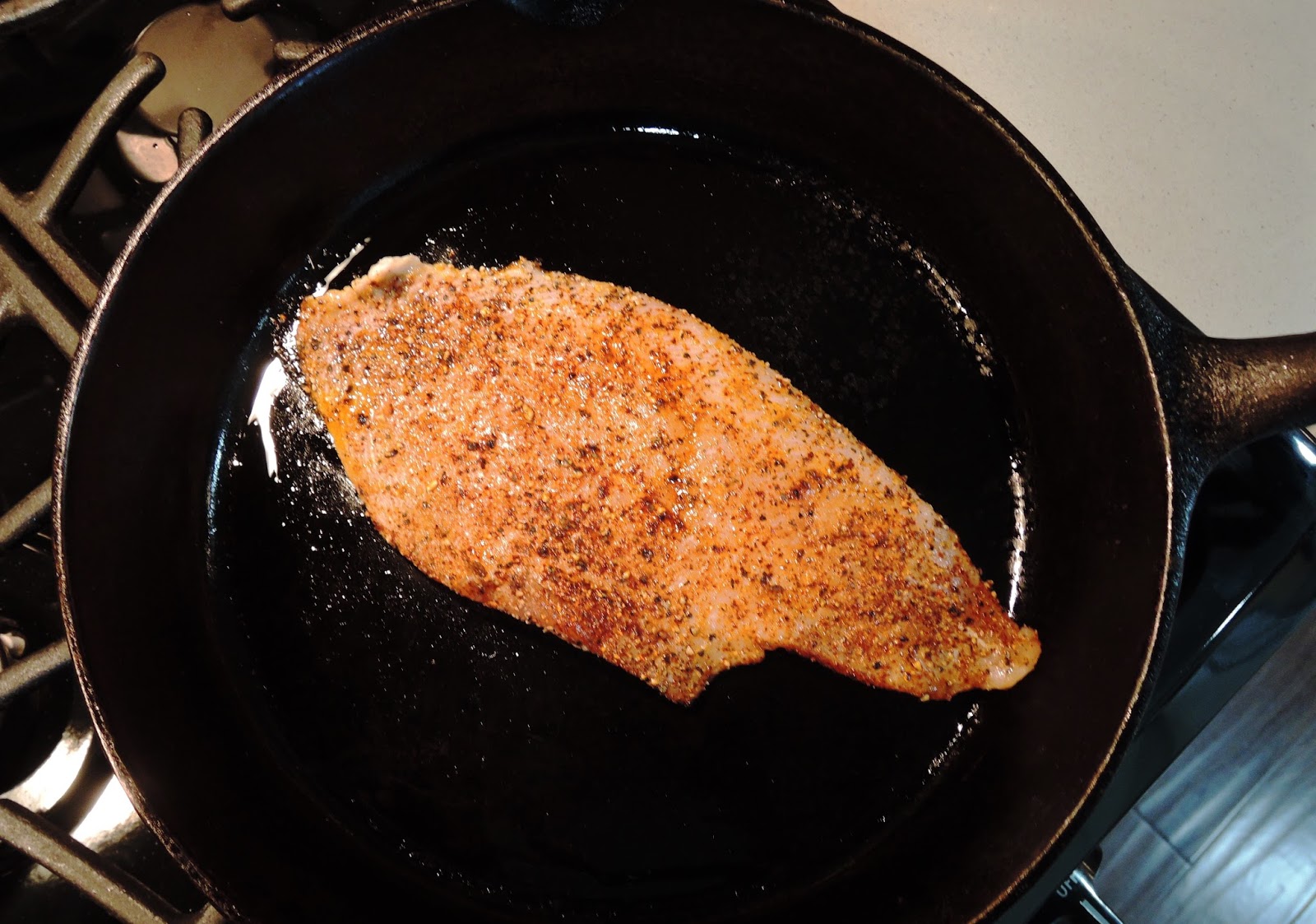 The Briny Lemon Blackened Flounder with Garlic Sautéed Kale