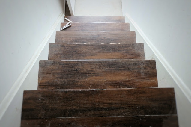 redone vinyl plank on back steps