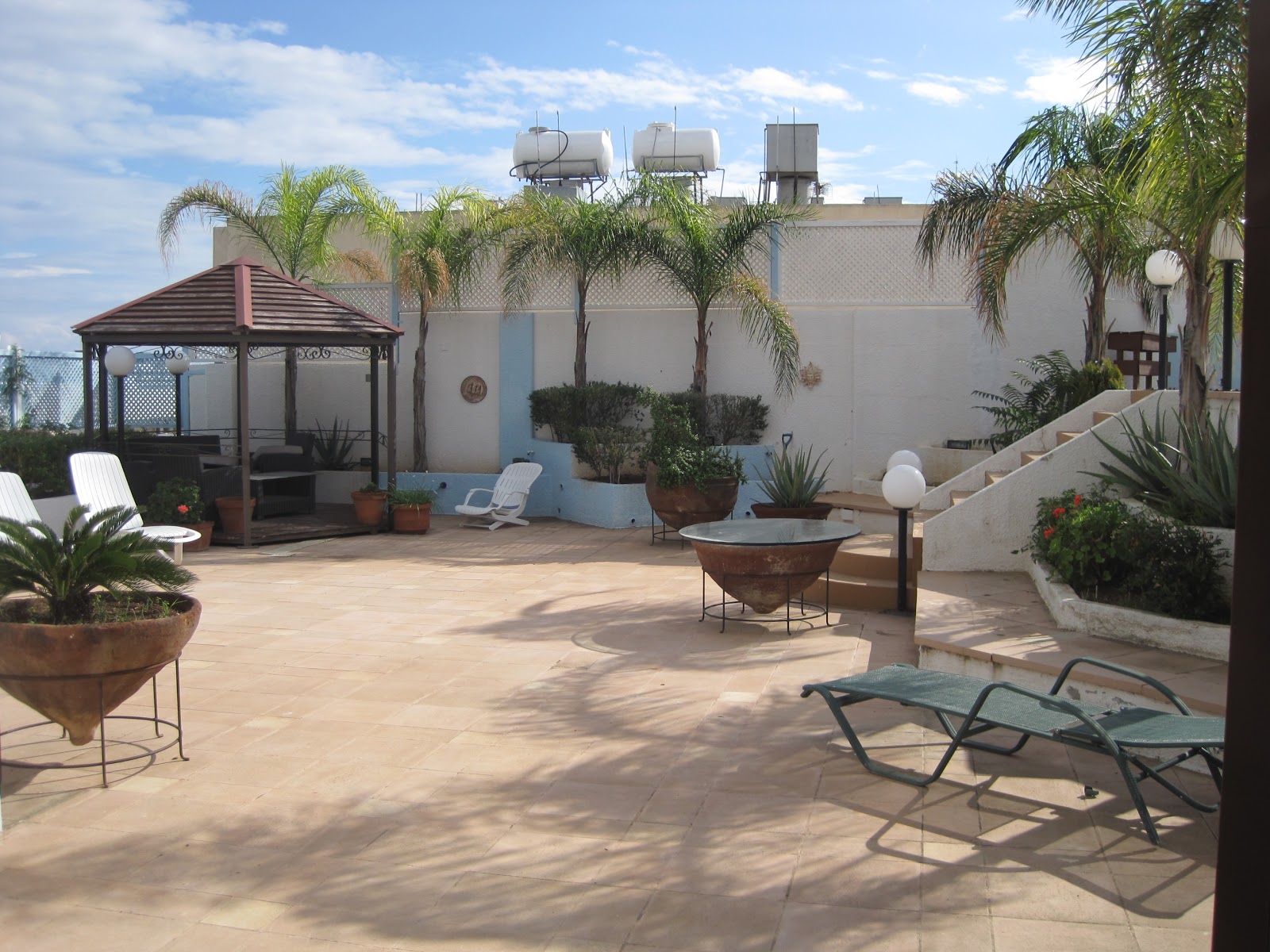 Executive penthouse for sale with private rooftop swimming pool.