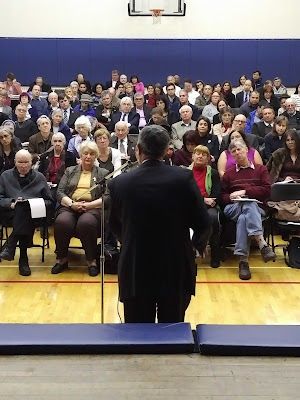 A photo from behind George Weigel, giving a talk to the CCRL