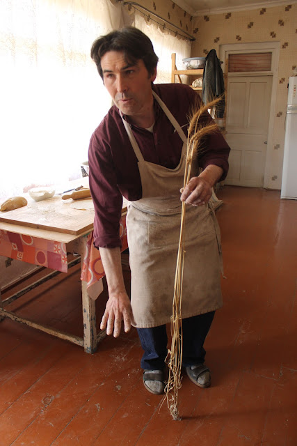 Jean Jacques showing the tall wheat Dolis Puri.