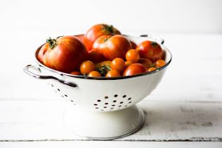 tomatoes in sieve