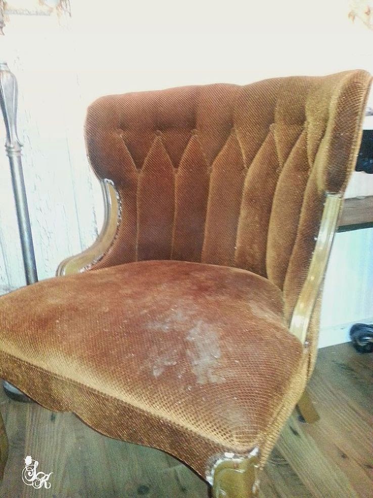 Before pic of old chair made over by painting fabric.
