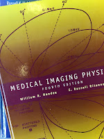 Medical Imaging Physics, by Hendee and Ritenour, superimposed on Intermediate Physics for Medicine and Biology.