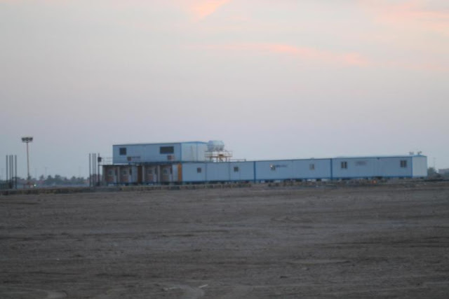 Picture of white construction houses on the Kingdom Tower construction site