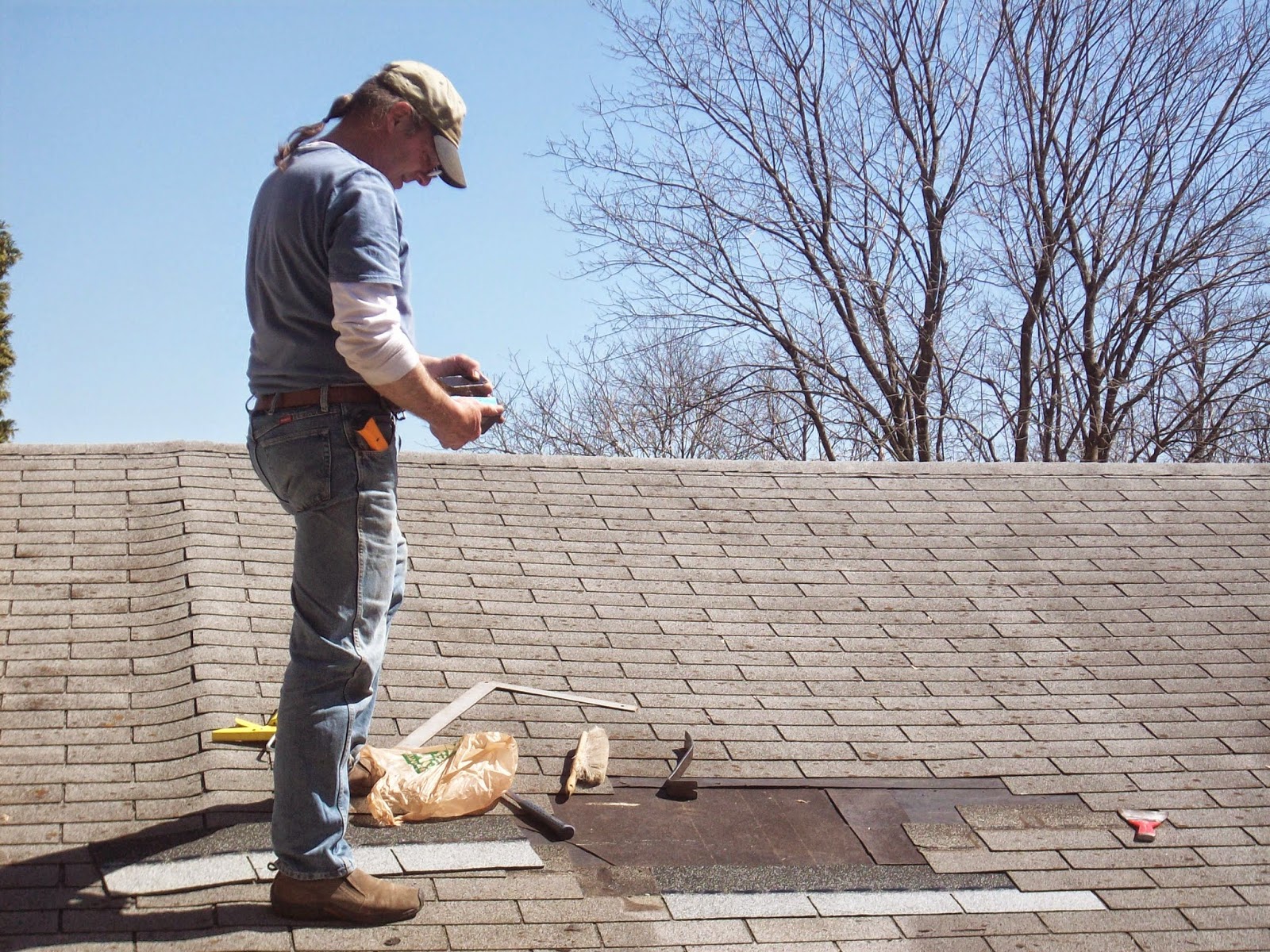 4 acres and a stream Garage Roof Patching