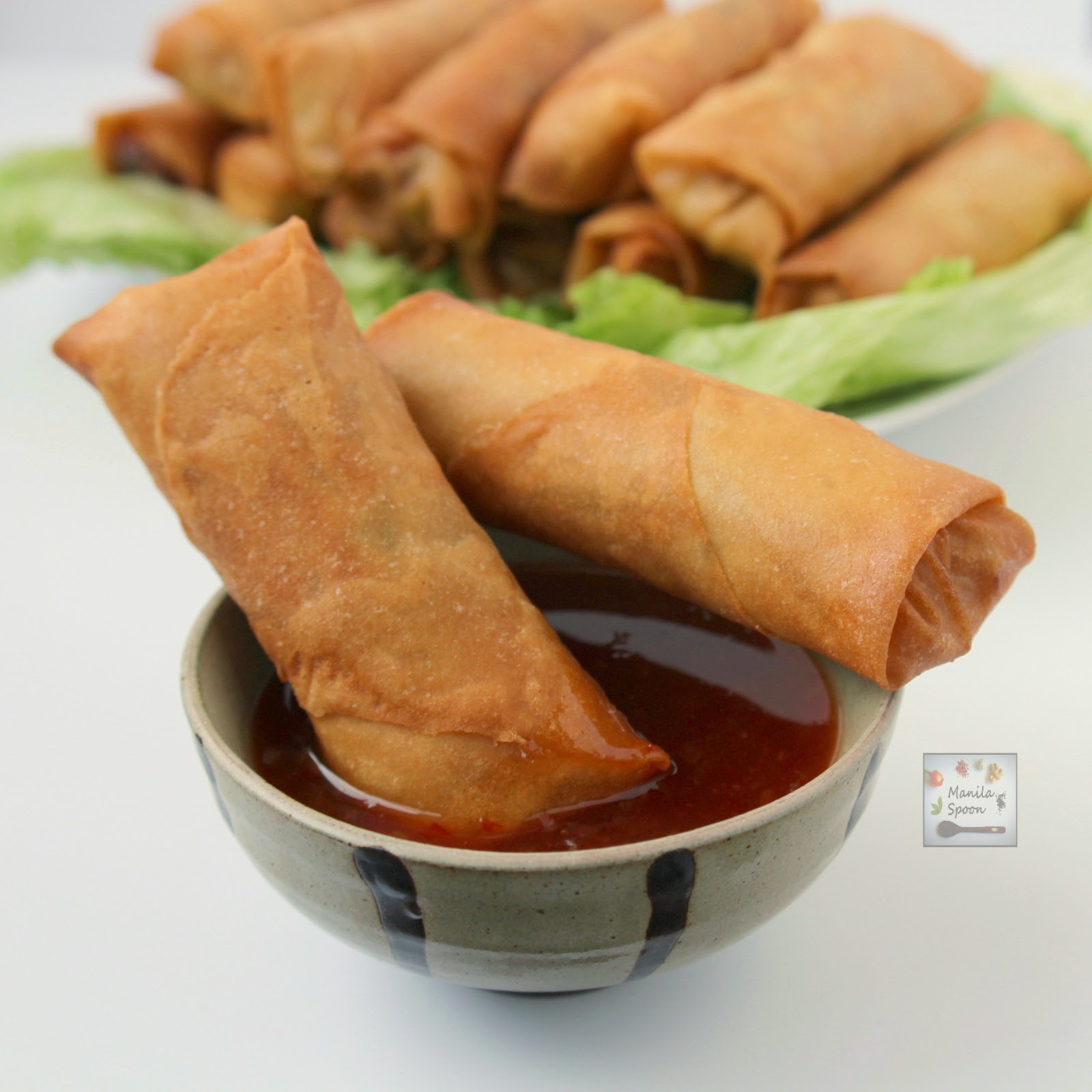 These crunchy and delicious spring rolls (Lumpia) are the perfect appetizers for any party and great for snacking, too. These can be made fully vegetarian or a little meat may be added, too. #easy #lumpia #vegetarian #appetizers #asian 