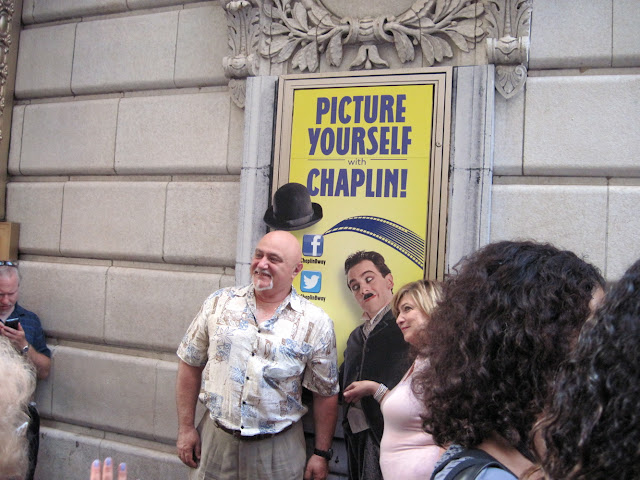 Patrons picture themselves as Chaplin before heading into the Old New York theater, The Barrymore