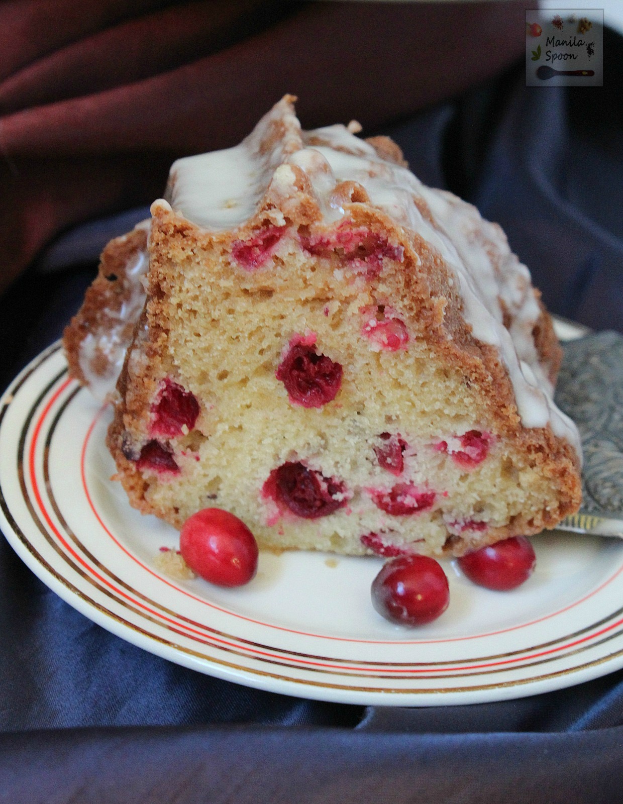 Use fresh, frozen or dried cranberries to make this moist and delicious White Chocolate Cranberry Coffee Cake. Perfect to serve for tea time as well. | manilaspoon.com