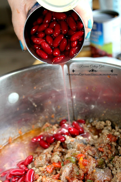 adding a can of beans to chili Chili Recipe, by Rosevine Cottage Girls