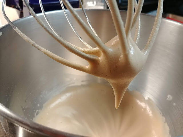 the bird's beak formed in the head of the whisk head of the stand up mixer. 