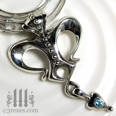 silver royal gothic necklace with blue topaz alice in wonderland