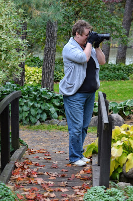 Tabatha taking pictures at Munsinger Gardens 10/19/2013 Photo by Trisha Field