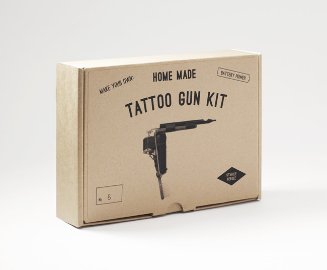 grey grid paper. home made tattoo gun kit.