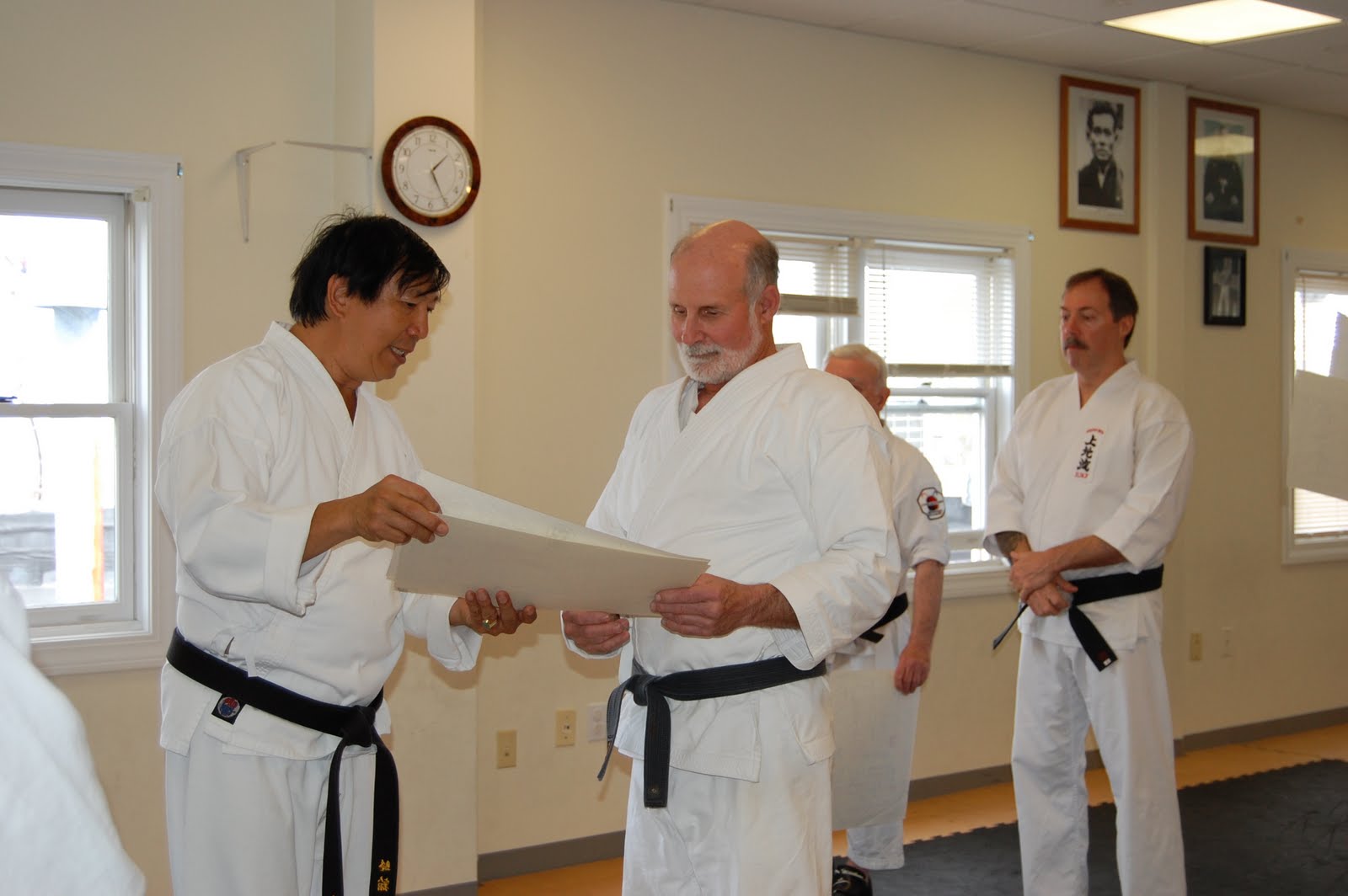 Budokan Martial Arts BLACK BELTS RECEIVING THEIR CERTIFICATES FROM SENSEI DARIN YEE AT THE