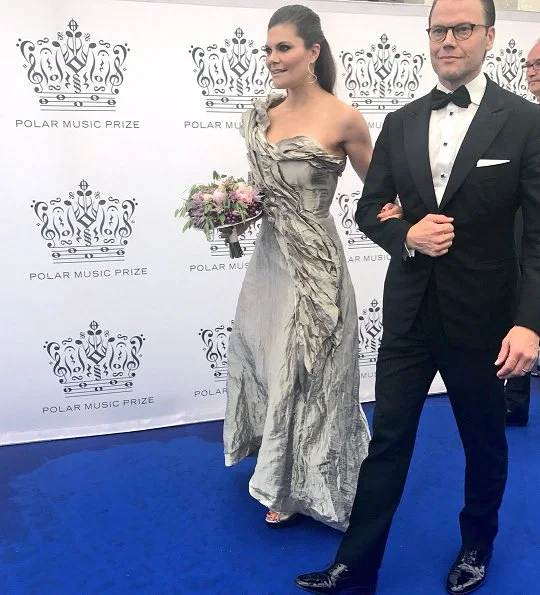 King Carl Gustaf, Queen Silvia, Crown Princess Victoria, Prince Daniel, Princess Madeleine, Prince Carl Philip and Princess Christina, Mrs. Magnuson