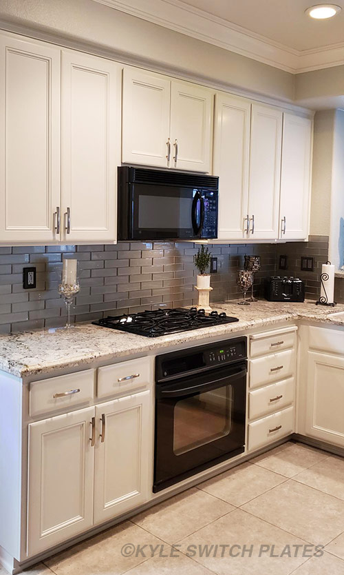 Kyle Switch Plates Dark Bronze Wall Plates for a Tiled Kitchen Backsplash