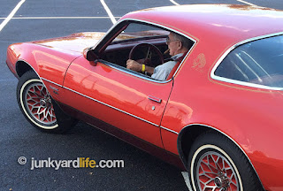 Hamilton wheels his 1979 Pontiac Redbird, 4-speed around the parking lot.