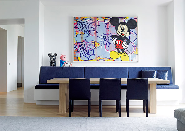 Mickey Mouse modern art in Paris dining room design by Piet Boon