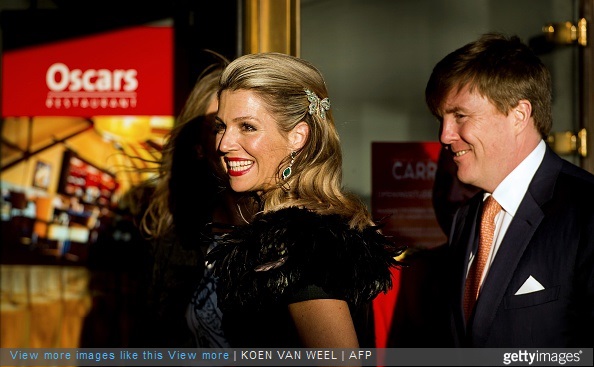 Dutch King Willem Alexander and Queen Maxima arrive at the Dutch 5th of May Liberation concert in Amsterdam on May 5, 2015