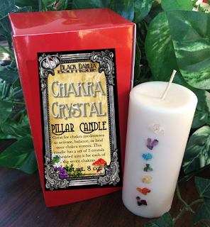 https://www.etsy.com/listing/505927181/chakra-crystal-chips-pillar-candle?ref=shop_home_active_1