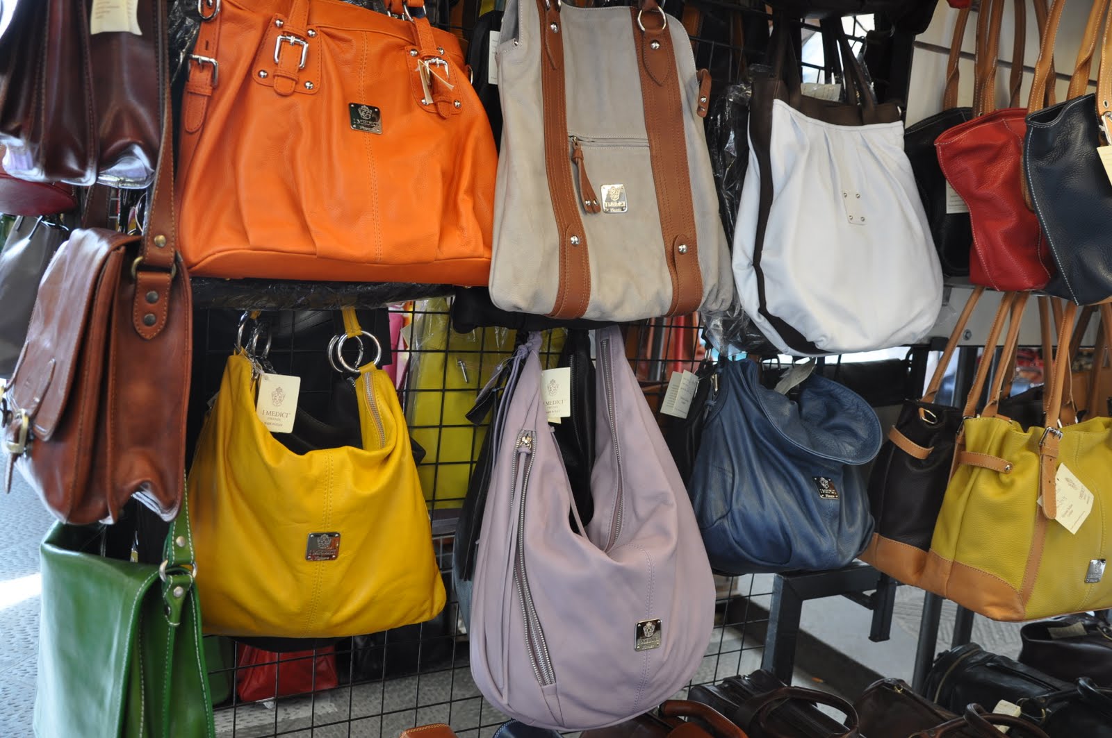 The Olive Journey Shopping at San Lorenzo Leather Market Florence, Italy