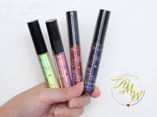 a photo of The Body Shop Shine Lip Liquid lipsticks Review in shades Lemon Sherbet, Blueberry Chew, Russet Copper and Black Liquorice by Nikki Tiu of www.askmewhats.com