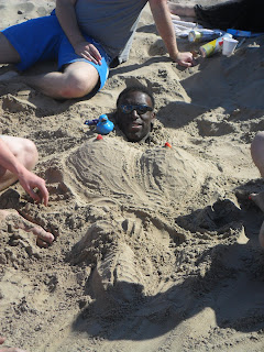 Ed buried in the sand
