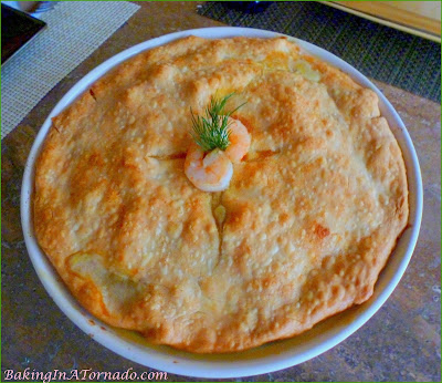 Shrimp Pot Pie, shrimp and vegetabless in a light sauce, cooked in a flaky crust | Recipe developed by www.BakingInATornado.com | #recipe #dinner #shrimp