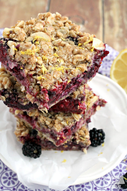 These Blackberry Lemon Almond-Oat Bars are just like your favorite blackberry crisp but in a deliciously plate-free/fork-free form.