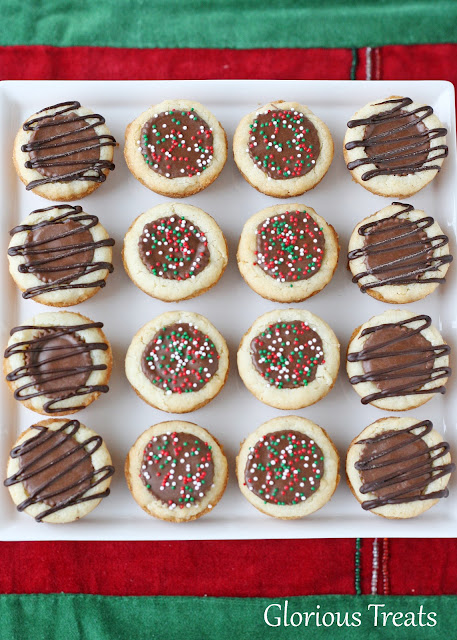 Peanut Butter Cup Cookies from Glorious Treats inkatrinaskitchen.com #BringtheCOOKIES peanut butter cup cookies plated with red and green sprinkles and drizzled with dark chocolate