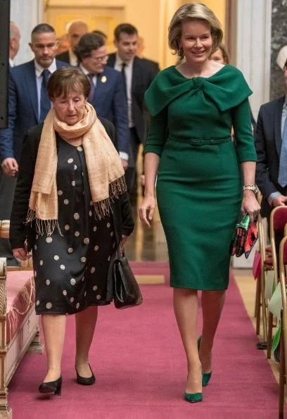 Queen Mathilde wore a green dress by NATAN. Queen Elisabethand Queen Fabiola Honorary Member of Belgian Royal Academy