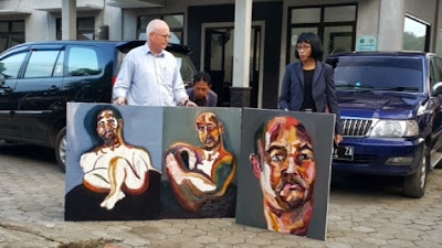 Lawyer Julian McMahon with three self-portraits by Myuran Sukumaran Lawyer Julian McMahon with three self-portraits by Myuran Sukumaran