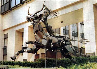 καὶ εἶδον γυναῖκα καθημένην ἐπὶ θηρίον